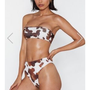 Cow print bikini bottoms.NWT